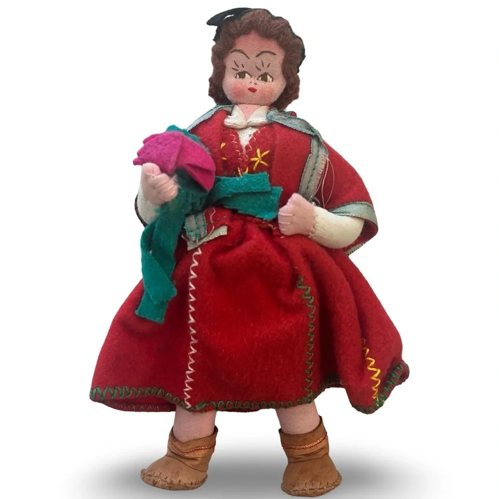 Handcrafted Red Doll with Green Accents